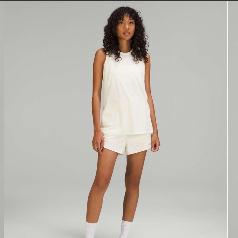 NWOT $128 Lululemon Tank-And-Short Romper With Pockets 3"Lemon Sorbet Size 6*L26